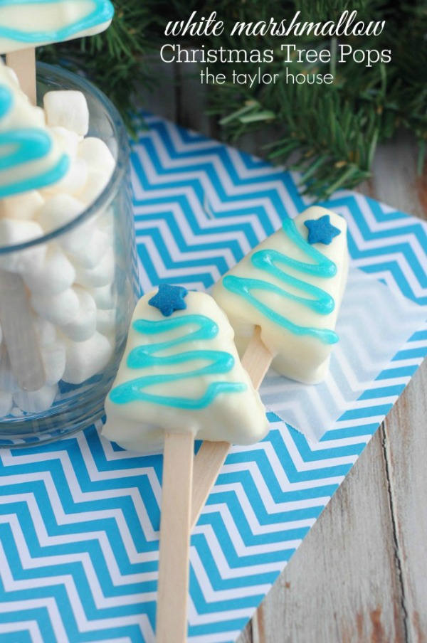 Just a few simple ingredients is all you need for these fun Christmas Treats! These White Marshmallow Christmas Tree Pops are fun for kids of all ages! Visit our 100 Days of Homemade Holiday Inspiration for more recipes, decorating ideas, crafts, homemade gift ideas and much more!