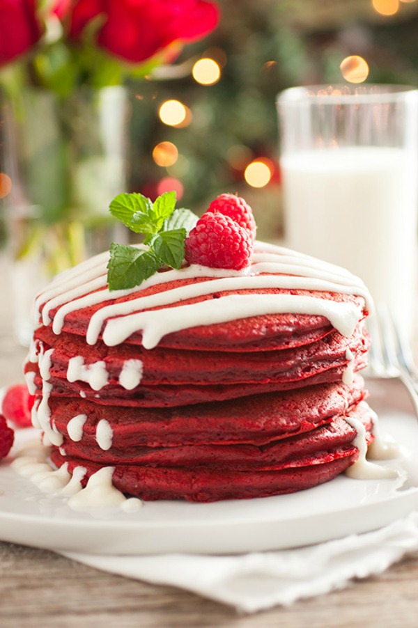 The perfect holiday breakfast, these Red Velvet Pancakes with Cream Cheese Glaze are sure to put a smile on your face! Visit our 100 Days of Homemade Holiday Inspiration for more recipes, decorating ideas, crafts, homemade gift ideas and much more!