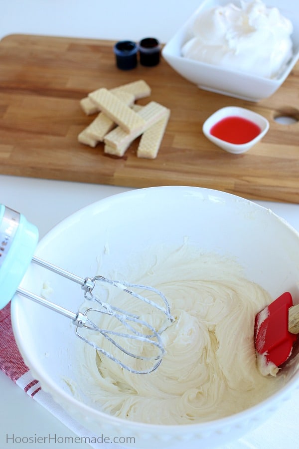 Mixing sugar and cream cheese for No Bake Cheesecake