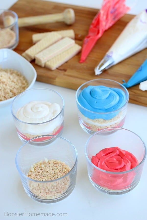 Adding No Bake Cheesecake to glasses