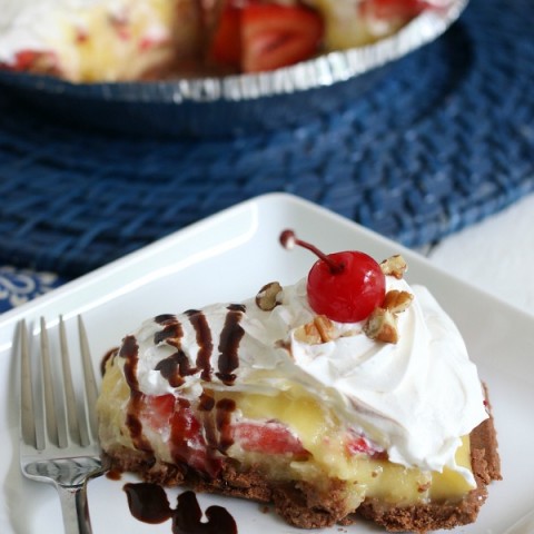 Banana Split Pie - Layers of Bananas, Pineapple, Strawberries, Pudding and Pecans, then topped with whip cream, maraschino cherries, chocolate sauce and more pecans. Yum! Click on the Photo for the Recipe!