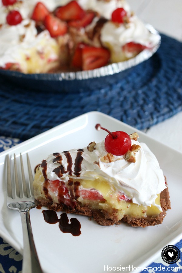 Banana Split Pie - Layers of Bananas, Pineapple, Strawberries, Pudding and Pecans, then topped with whip cream, maraschino cherries, chocolate sauce and more pecans. Yum! Click on the Photo for the Recipe!