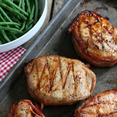 If you don't grill anything else this Summer, you MUST try these Barbecue Bacon Pork Chops! They are tender, juicy and full of flavor! Click on the Photo for the Pork Chop Recipe!