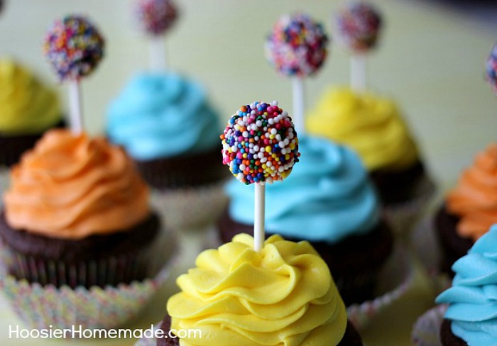 CHOCOLATE CUPCAKE RECIPE -- These FUN cupcakes are the perfect Kid's Birthday Cupcakes - they are even great for kids of ALL ages! The Dum Dum Sucker topper is super easy to make! The cupcakes are moist and delicious!