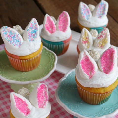 These Easy Bunny Cupcakes are perfect for Easter or Spring! They start with a 3-color cupcakes, white frosting and marshmallow bunny ears and tail. The kids will have a blast helping with these Easter Cupcakes!