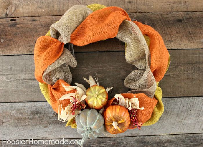 DIY FALL WREATH -- ThIS Fall Wreath takes minutes to make with just a few supplies! Brighten up your front door or inside your home with this easy to make wreath!