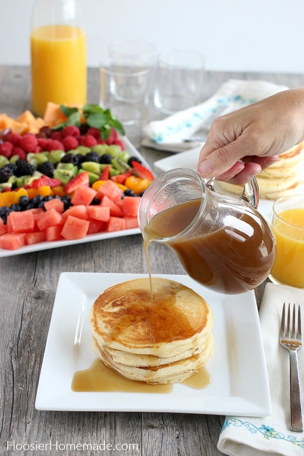 Homemade Syrup pouring over pancakes