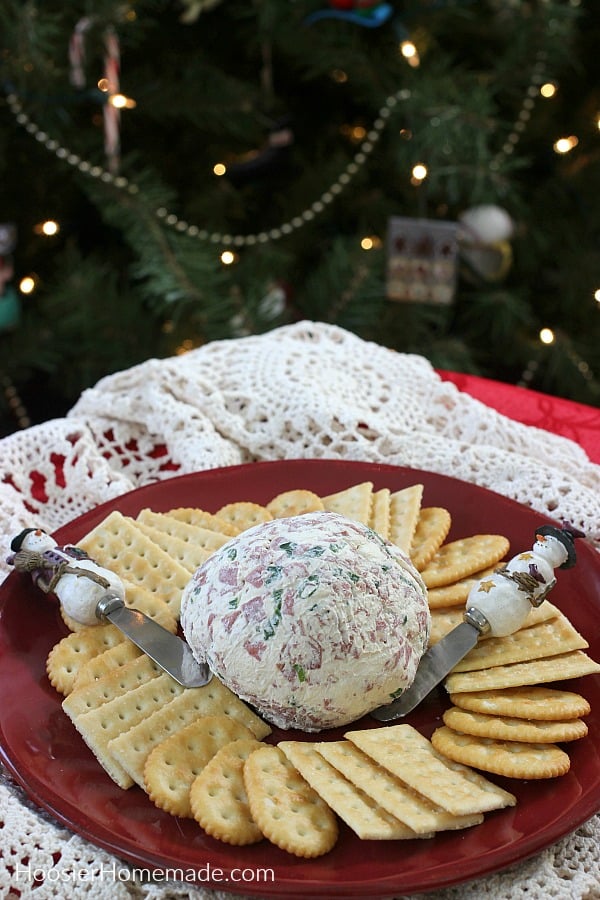 Cheese Ball on plate by Christmas tree