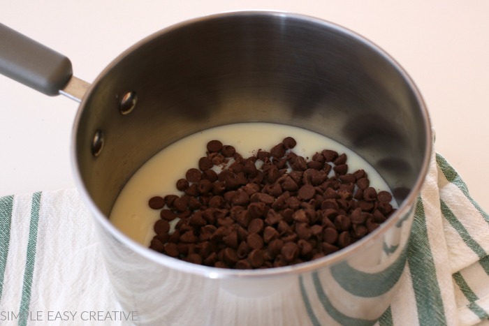 Sweetened Condensed Milk and Chocolate Chips in a pan