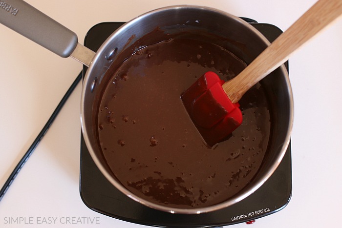 Chocolate Fondue melted in saucepan