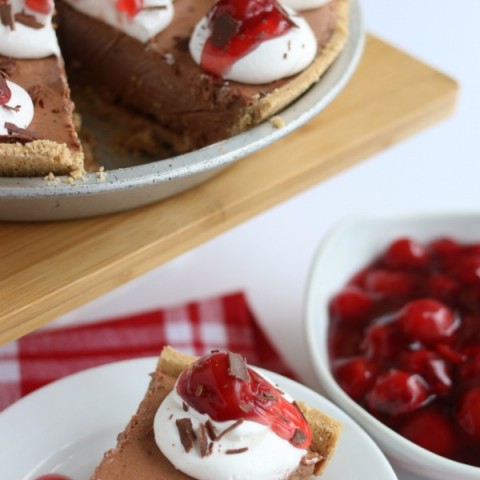 This 5 ingredient simple Ice Cream Pie will impress your family and guests! Add whip cream and cherries to send it over the top! Easy enough for a weeknight dessert yet perfect for a special occasion!