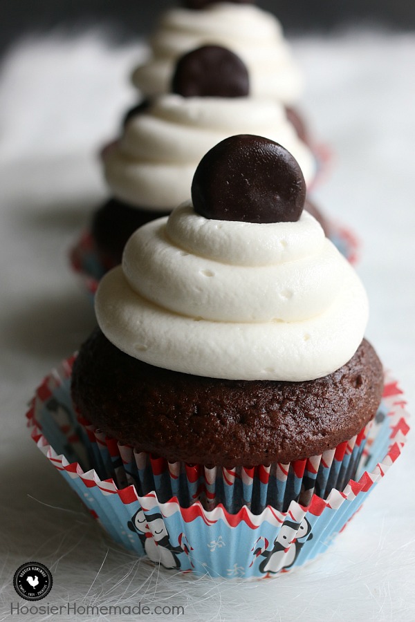 These Chocolate Peppermint Pattie Cupcakes are bursting with flavor! A simple chocolate cake mix is turned into a luscious holiday treat. And then if that's not enough, topped with Buttercream Peppermint Frosting and a mini Peppermint Pattie.