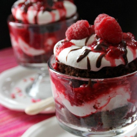 Rich moist Chocolate Cake, covered with Raspberry Jam, whipped topping and Hot Fudge - the perfect Valentine's Day dessert! This Chocolate Raspberry Trifle is super easy to make yet it looks impressive!