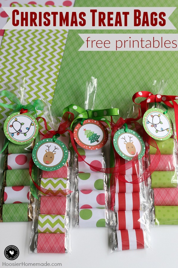 Create these easy Christmas Treat Bags in minutes! Perfect for classroom treats, teacher gifts, neighbors, friends or family! Grab the FREE Christmas Printable to add to the scrapbook paper wrapped candy! Learn more on HoosierHomemade.com