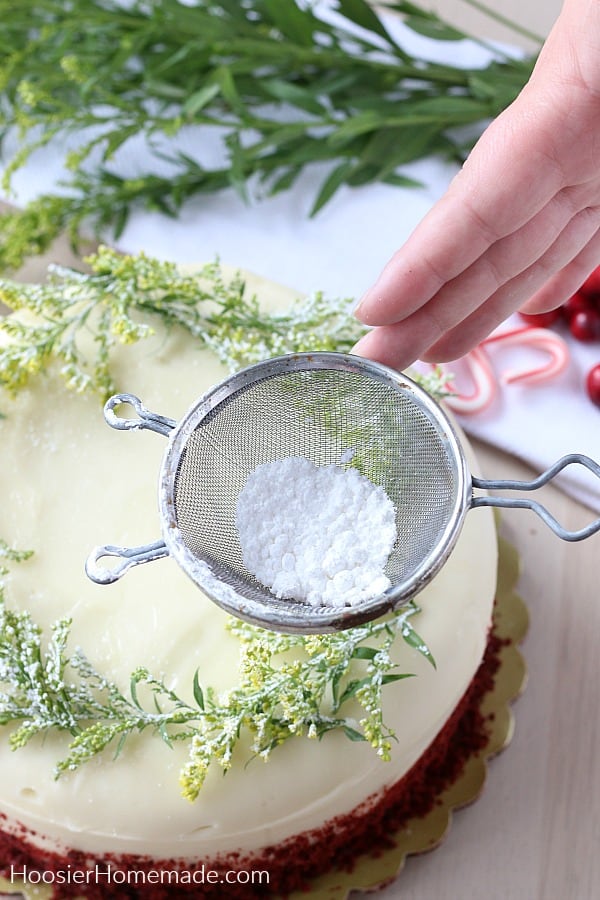 Decorating store bought cake with powdered sugar