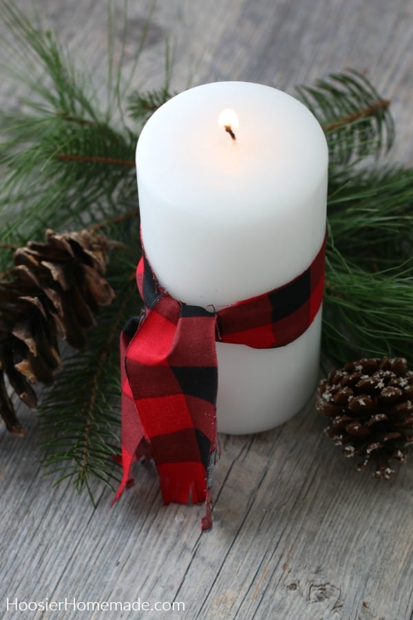 Candle with fabric ribbon