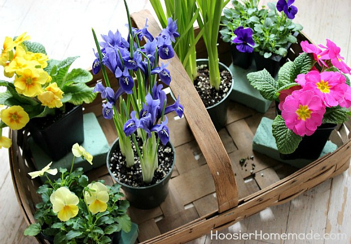 Add flowers to Easter Flower Basket Centerpiece