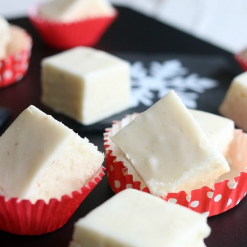 The perfect holiday treat to make and share as gifts - this Eggnog Fudge is EASY to make, goes together quickly AND is made with Dairy FREE Eggnog! Whip up a batch to share with friends, teachers, neighbors, co-workers and more!