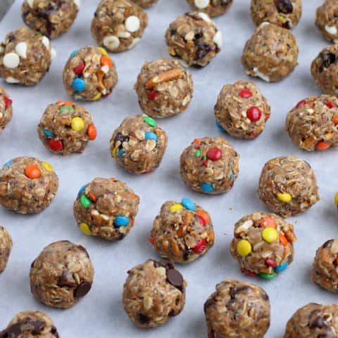 energy balls with mix ins on a pan