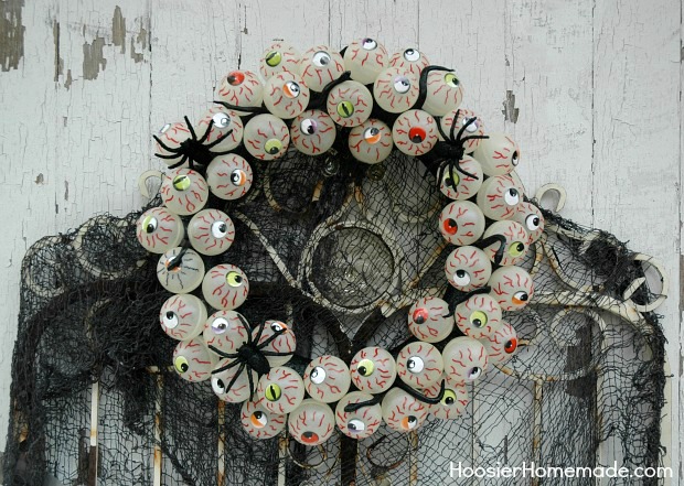 Halloween Craft - Easy to make Eyeball Wreath that Glows-in-the-Dark | Instructions on HoosierHomemade
