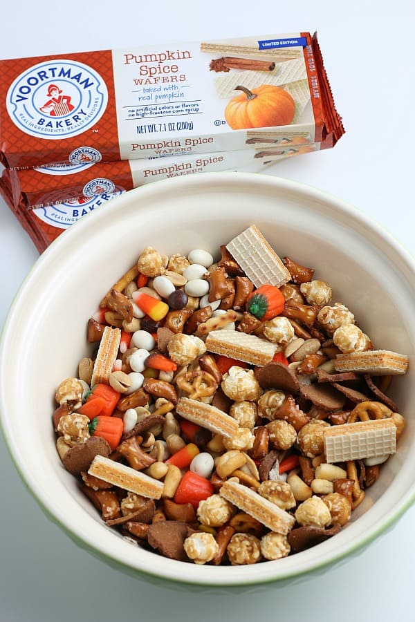 Fall snack mix in large green bowl