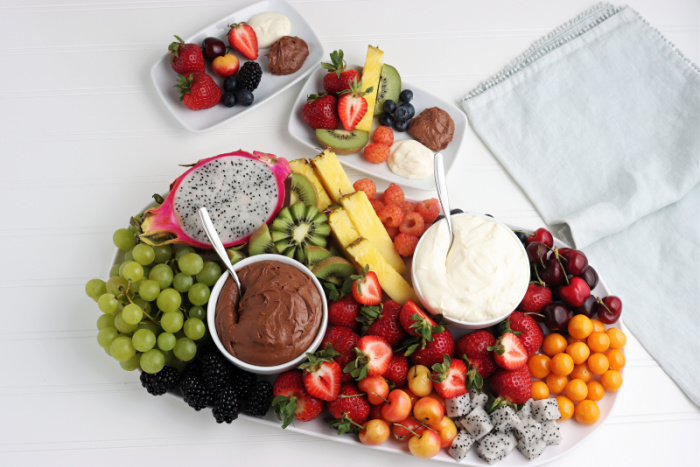 Fruit Board with Chocolate Dip and Fruit Dip on white platter