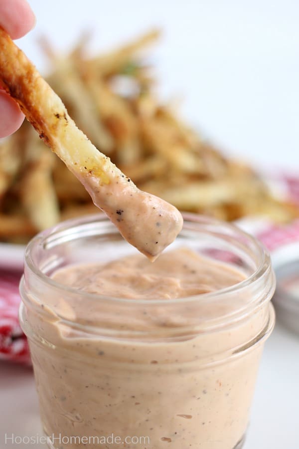 French Fry dipping in Fry Sauce