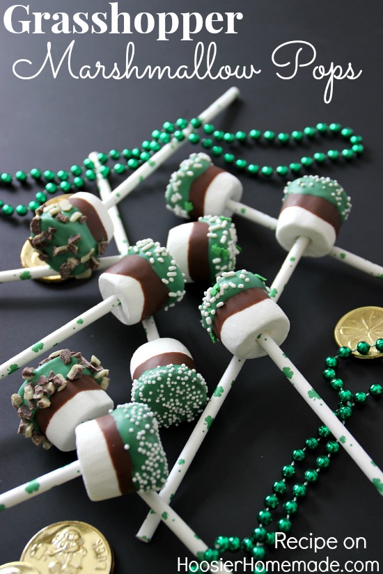 Grasshopper Marshmallow Pops - super easy St. Patrick's Day Treat! Chocolate and Mint coated marshmallows - what's not to love? Just 3 ingredients plus sprinkles and only 15 minutes of your time! 