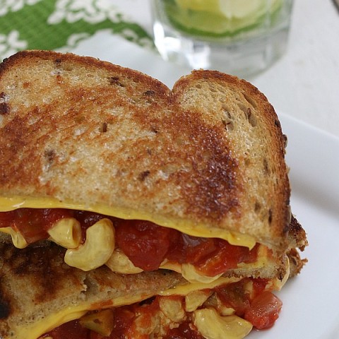 GRILLED MACARONI AND CHEESE FIESTA SANDWICH -- Take your ordinary grilled cheese up a notch! Add macaroni and cheese, salsa and a special ingredient to send it over the top!