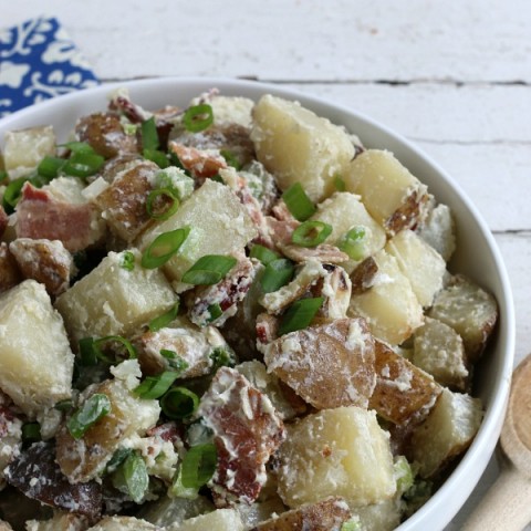 Bacon Potato Salad - change up your ordinary potato salad by grilling the potatoes, adding bacon and a light dressing for one out of the world Potato Salad Recipe! Save by pinning to your Recipe Board!