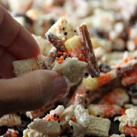 Whip up this fun Halloween Treat in about 15 minutes! Kids and adults will love this Candy Corn Party Mix! Pin it to your Halloween Board!