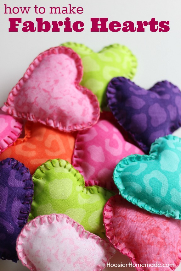 Learn how to make these colorful Fabric Hearts! Hang the fabric hearts on a string, decorate with them, or use them on a wreath - the options are endless! Pin to your DIY Board!