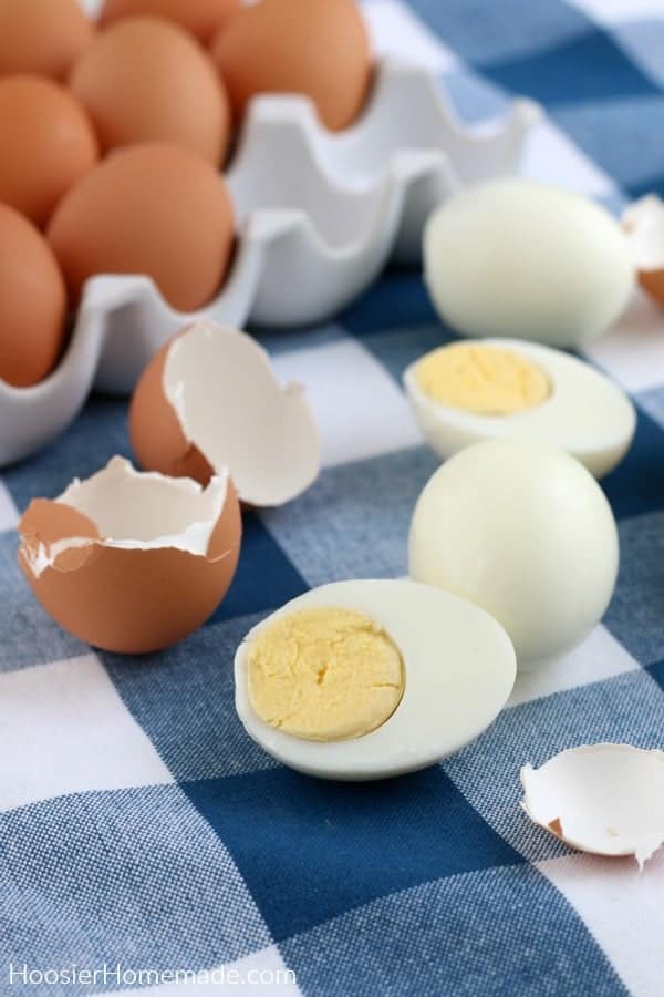 Closeup of Instant Pot hard boiled eggs peeled on a blue napkin