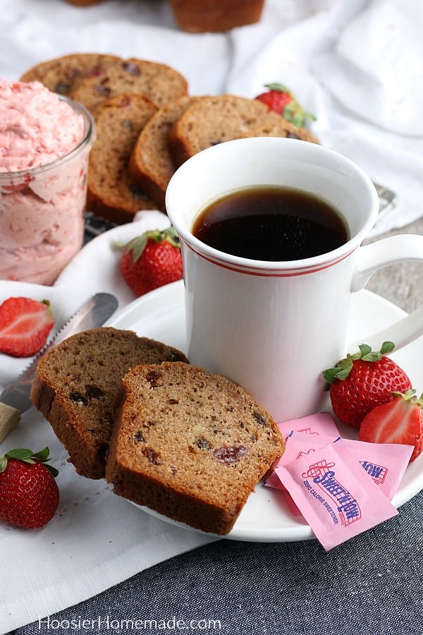 Jam Cake sliced on plate with tea