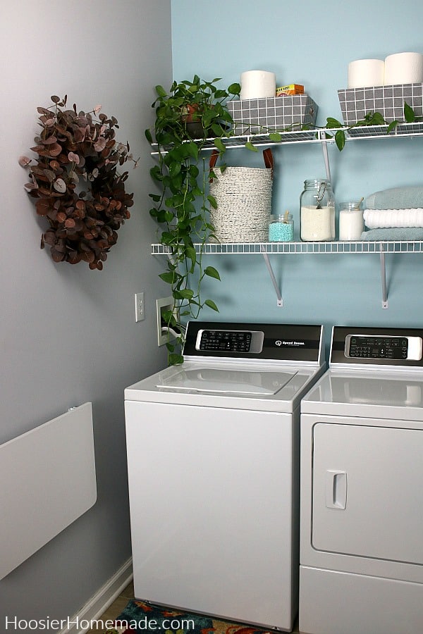 Wreath on wall in small laundry room