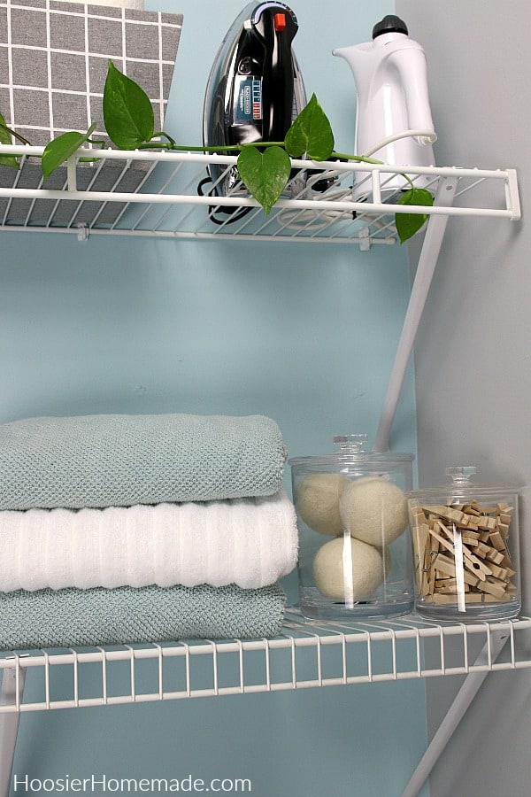 Dryer balls and clothes pin in small laundry room