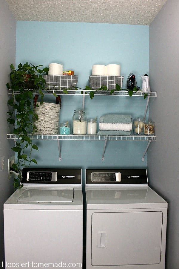 Small laundry room shelves decorated