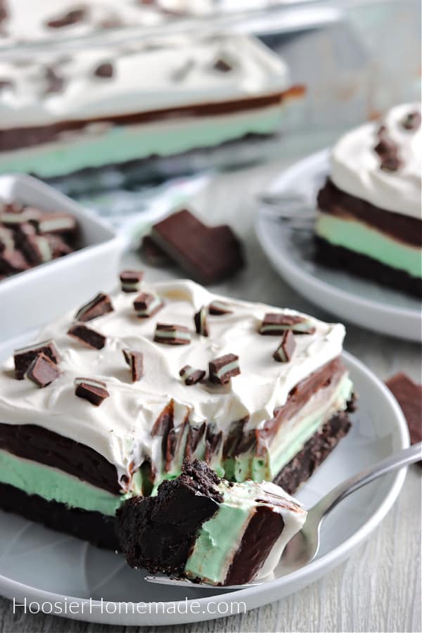 layered mint dessert on white plate with fork