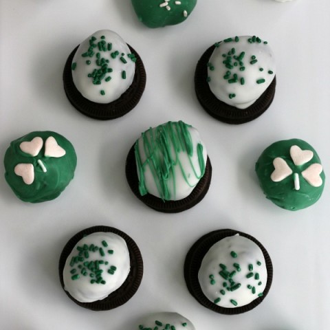 Mint Oreo Truffles - ONLY 3 ingredients is all you need for these delicious St. Patrick's Day treats! The kids will have a blast crushing the Oreos, and helping form the balls. Dip in chocolate coating, add sprinkles and you have a fun treat! Pin to your Recipe Board!