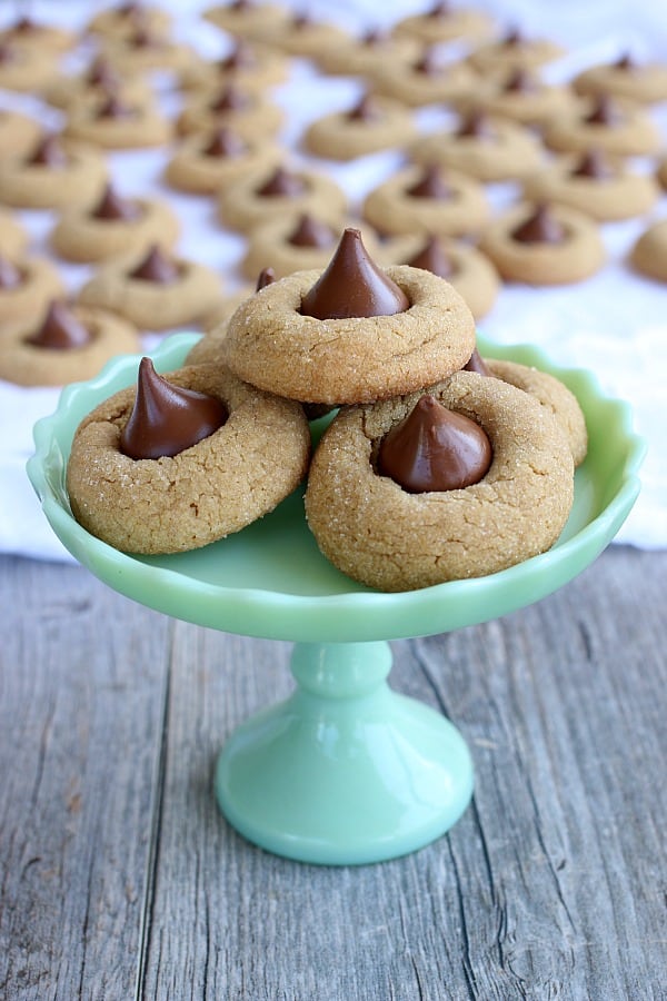 Peanut Butter Blossoms on green cake stand