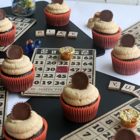 PEANUT BUTTER CUP CUPCAKES -- These Chocolate Cupcakes start with a moist, delicious recipe that includes peanut butter cups in the cupcakes, and topped with a creamy Peanut Butter Frosting! And of course, another Peanut Butter Cup on top!