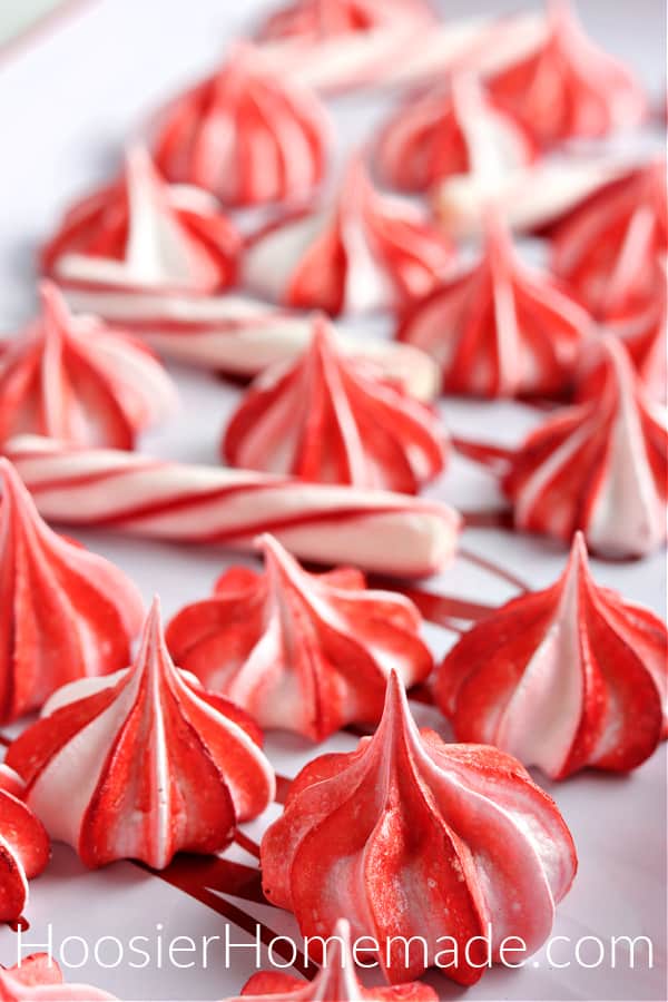 red and white meringue cookies on tray 