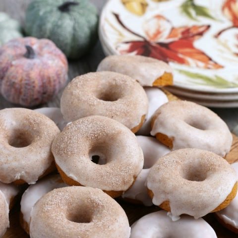 pumpkin donuts with icing and sugar