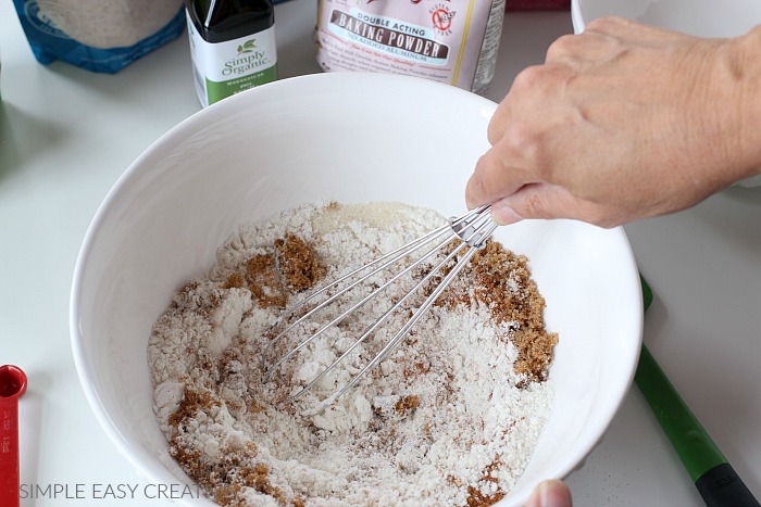 Whisk dry ingredients for pumpkin cobbler