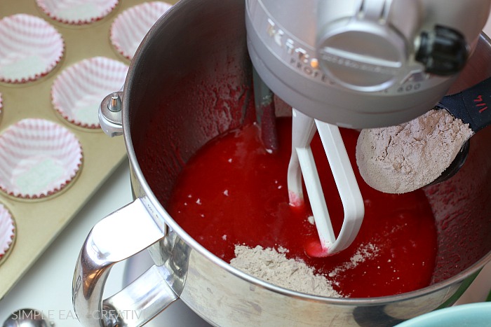 Adding dry ingredients to Red Velvet Cupcakes
