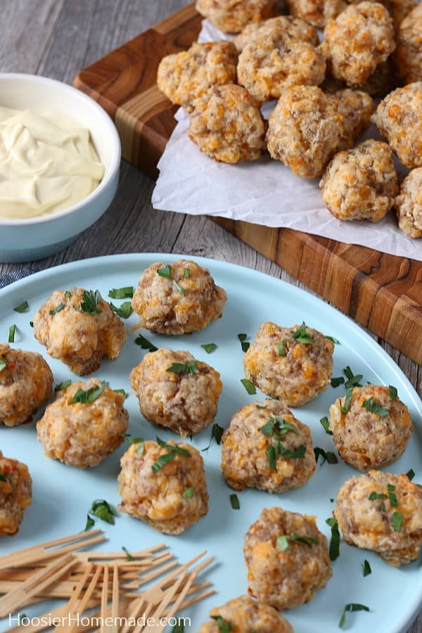Sausage Balls Recipe on blue plate with dipping sauce