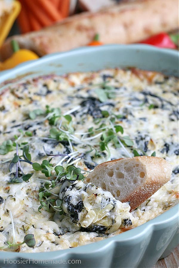 spinach artichoke dip served with bread