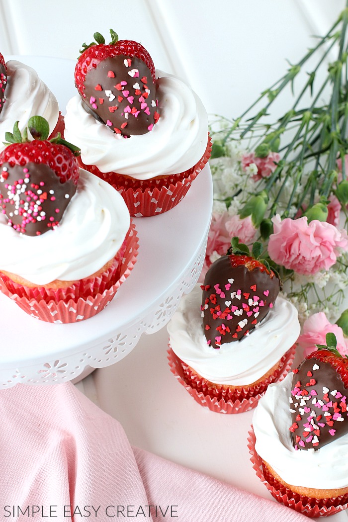 Strawberry Cupcakes filled with Strawberry Glaze and Marshmallow Frosting