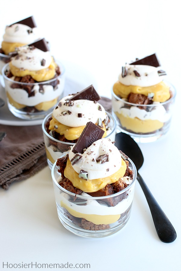 Bowls of brownie pudding and whip cream