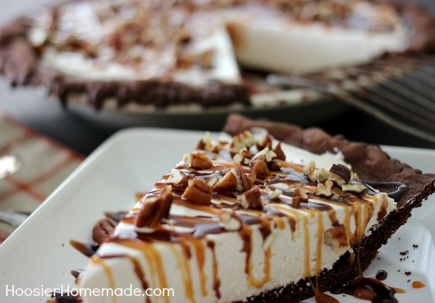 Turtle Pie : Chocolate Cake Mix Pie Crust filled with No Bake Cream Cheese filling, and topped with caramel, hot fudge and pecans! Recipe on HoosierHomemade.com